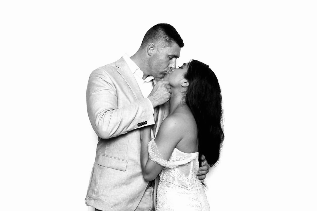 Couple posing for a glam photo booth: glam photo booth rental in Burlington