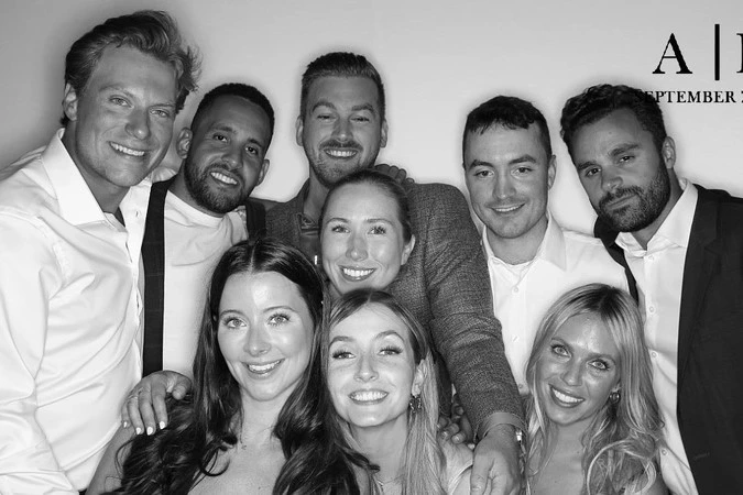 Group posing for a picture at a Wedding Photobooth at an Event in Toronto